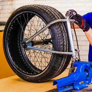Unusual bicycle upgrade with a car tire