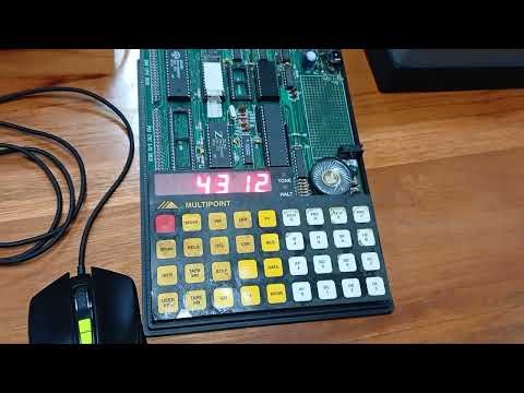 Membuat display tulisan berjalan (running text) pada modul praktikum Z80 yang berisi NIM dan Nama.