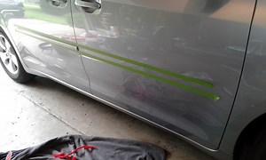 Added after market body side molding