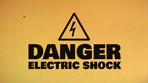 Download Caution Hazard Icon On Bad Old Film Tape for free