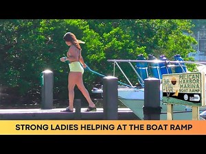 LADIES HELPING AT THE BOAT RAMP