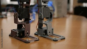 Developing a robot for young scientists. The legs of the robot. Robo technology.