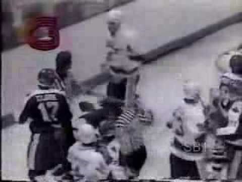 Wendel Clark hits Bruce Bell