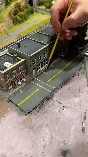 Realism Rails NJ on Instagram: "Let’s keep the mind flowing! Hit the comments with your ideas for the next video 💪🏼 #trains #paint #art #lionel #nscalemodeltrains #scalemodeling #weathering #mth #oscaletrains #artist #timelapse #traintracks #railroad #smalltown #town"