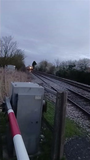 class 170 thrashes through the crossing #train #railway