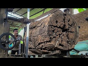 Brave workers conquering wooden monsters barefoot? Dangerous or incredible?
