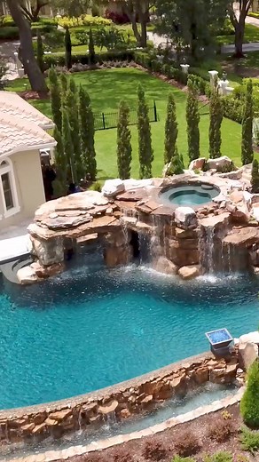 454K views · 9.2K reactions | This spa is built into the top of the grotto and sits 8.5 feet above the pool below. We used 168 tons of rock to build the grotto. #insanepools #lucaslagoons | Lucas Lagoons | Facebook