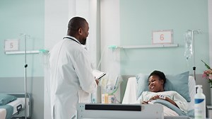 Premium stock video - Patient, check and doctor in hospital