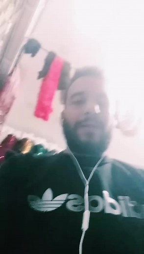 Adidas Hoodie Style in a Colorful Room