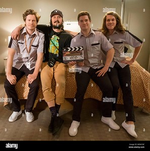 GAME OVER, MAN!, from left: Anders Holm, director Kyle Newacheck, Adam Devine, Blake Anderson, on set, 2018. ph: Cate Cameron /© Netflix /Courtesy Everett Collection Stock Photo - Alamy