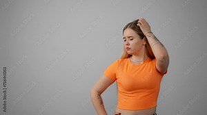 Young woman thinking to solve a problem. Pensive girl thoughtfully at idea hold hand to chin with gesture of thought about problem solution with puzzled facial expression isolated. Decision concept.