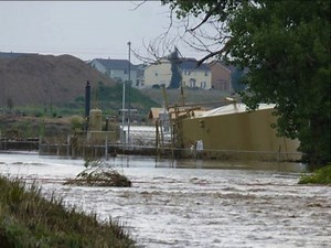Oil and fracking chemicals spill into Colorado's floodwaters
