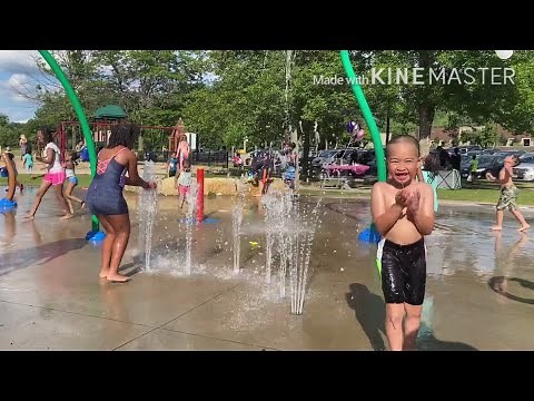 Kids Enjoy Water Fountain In Cliff Fen Park