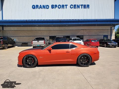 Walk around a 2011 Chevrolet Camaro 2SS in orange with Whipple Supercharger and black Z28 wheels