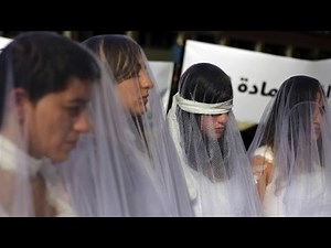 Bloodied brides protest ancient rape law