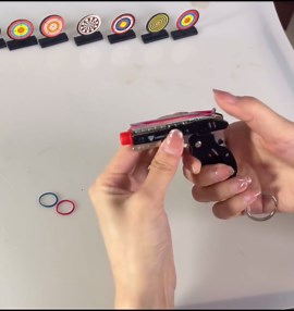 Rubber Band Gun New Generation Upgrade Mini Metal Foldable Toy Gun Keychain Quickly Shoot 8 Rubbers Orange tip Effectively identifiable Toy Gun Comes with 100 Color Rubber Bands