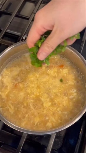 Aila Lin | Easy Asian Recipes on Instagram: "Grandma’s favorite dough drop soup that she’s had for over years has now become my favorite winter breakfast go to Ingredients: Dough drop: 150g all purpose flour 60g water Soup base: 2-3 stalks scallion 2 tomatoes 1 tbsp soy sauce A pinch of salt 1 egg A pinch of dried shrimp, optional Instructions: Mix flour with water. Pour the water in like tiny droplets—don’t make one big dough! Each droplet will cook into little noodles. Once the dough forms, se