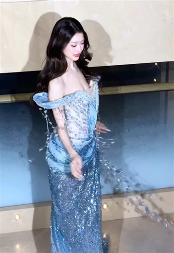 A LIGHT UNBOUND – BRIDAL COLLECTION 2026 Like a water nymph emerging from a dream, the design radiates in an enchanting shade of blue. Crystal embellishments cascade like dewdrops, shimmering with every step to create a luminous effect capturing a beauty that is at once delicate, ethereal, and quietly regal. ______________ Jewelry: PNJ _______________ 𝐋𝐈𝐍𝐇 𝐍𝐆𝐀 𝐂𝐎𝐔𝐓𝐔𝐑𝐄 Vietnam Heritage, Refined Elegance ✨ Worldwide Shipping ✨ Ho Chi Minh City: 284A Nam Ky Khoi Nghia, Xuan Hoa Ward |