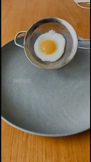 Poaching an Egg Using a Sieve