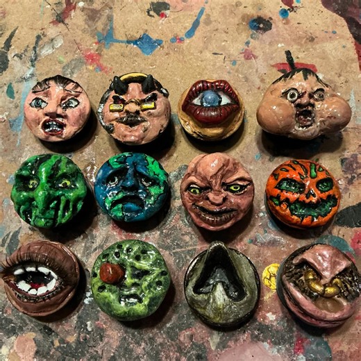 Zachary Strupp on Instagram: "First wave of pop sockets complete. Waddya think? . . #popsocket #sculpture #sculptor #horrorartist #filthyhorrorsdotcom"