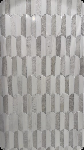 Wayne Tile | Tile Inspiration & Design Ideas on Instagram: "Explore our creative displays at our Ramsey showroom! From stunning terrazzo to intricate marble mosaics, our latest display features a stylish bench and smart niches for storage. Visit us to bring these timeless designs to your space! #TileDesign #MarbleMosaics #TerrazzoStyle #InteriorInspo #interiordesign"