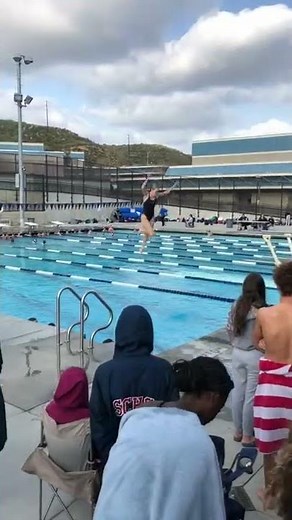 Woman Falters While Diving Off Diving Board - 1301520
