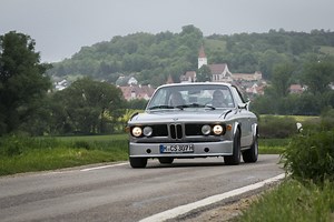 Tesla-Powered BMW 3.0 CSL Replica Drag Races Ford Mustang V8