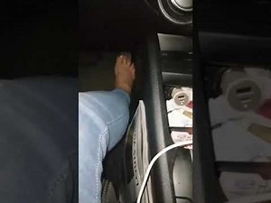 girl driving kinda fast barefoot
