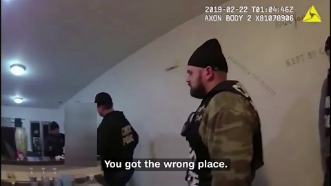 Bodycam video shows police raid on innocent woman's home