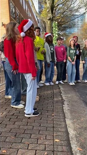 Enloe High School acapella group sings Christmas carols
