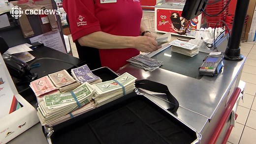 A Saskatoon man buys a full-sized canoe with a briefcase full of Canadian Tire cash. — eh! #TheMoment www.cbc.ca/1.5193298 | CBC News: The National
