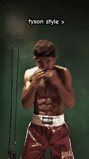 Houx The Physio on Instagram: "PEEKABOO style, orginally adopted by Floyd Patterson, who was Cus D'amato's first experiment. Then came Iron Mike Tyson, who perfected this style and became the youngest boxing heavyweight champion. #tyson #miketyson #peekaboo #boxing #ufc #mma #reels"