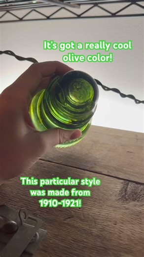 Olive green glass insulator!