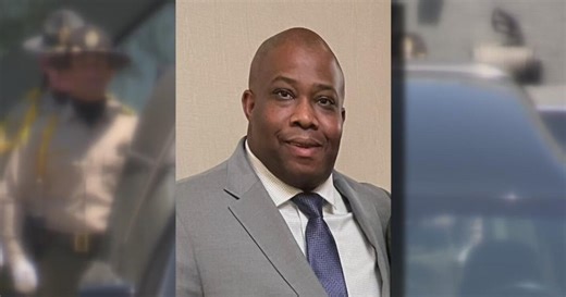 Slain parole agent honored in procession as new details on suspect emerge