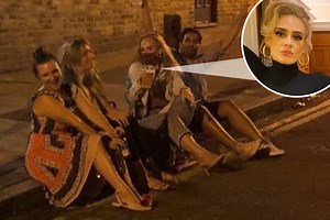 Adele holds pint of beer and a cigarette after 7st weight loss as she parties with pals on the street in London