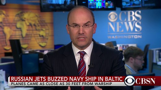 Russian jets buzz U.S. warship in "simulated attack pattern"