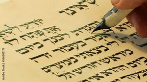 Sofer writes a Hebrew Passover Hagada, Close up a Jewish text that sets forth the order of the Passover Seder, Israel, 2022