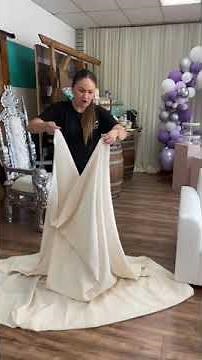 How to fold a round tablecloth.