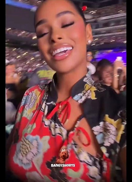 Taina Williams and Emily B vibing out at The R&B Tour with Usher and Chris Brown all smiles all vibe