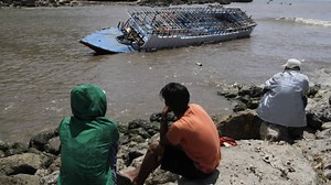 Asylum-seekers ‘sew lips’ at detention camp