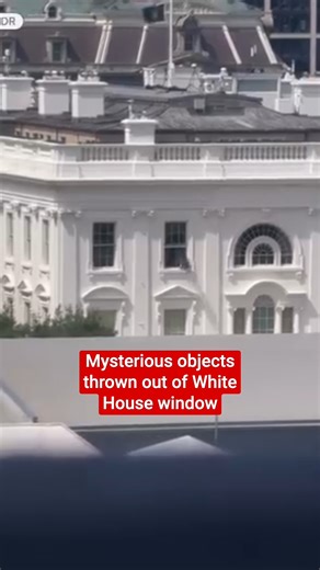 A video showing objects being thrown from the windows of the White House sparked conspiracy theories online. But a White House official told The Independent that the window was opened — and the bag tossed out — by "a contractor who was doing regular maintenance while the President was gone." | The Independent