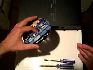 How to avoid a disc becoming stuck by the disc tray in an original thick Sony PlayStation 2 Phat