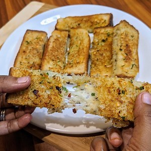 323K views · 2.8K shares | Cheesy garlic breadsticks a super delicious snack recipe. All the cheese lover must try this recipe. It's cheesy and flavorful. Cheese and garlic one of the best combination. Do try this recipe. | Cooking Lovers | Facebook