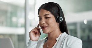 Woman consultant, call center communication and computer for customer service, support or advice in office. Philippines advisor or business agent speaking for contact us, FAQ or e commerce on laptop