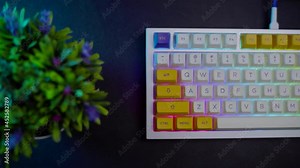 footage of a premium custom keyboard build kit with full alluminium base and bright RGB LED Colors