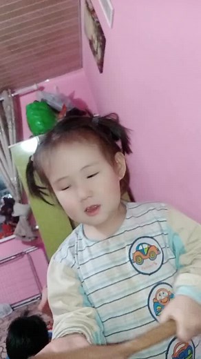 Child Interacting with Toys at Home