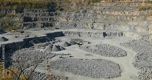 Large open iron ore quarry, panorama of a large stone quarry, equipment in the quarry, Open pit working process, quarry mining Stock Video