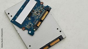 Close-up of an SSD circuit board, showcasing the complexity and precision of modern storage technology.
