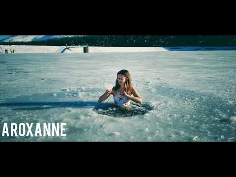 Woman ice swimming, Scotland, UK 2021