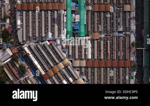 Top down aerial view flying over crowded Chatuchak Weekend Market in Bangkok. Unique urban patterns and colorful stalls Stock Video Footage - Alamy